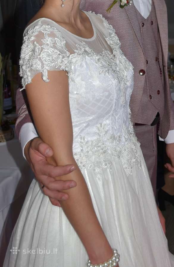 Proginė suknelė