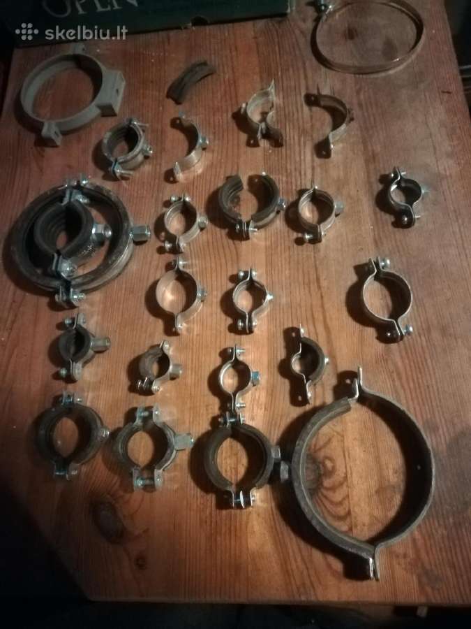 Parduodami įvairūs metaliniai vamzdžių laikikliai