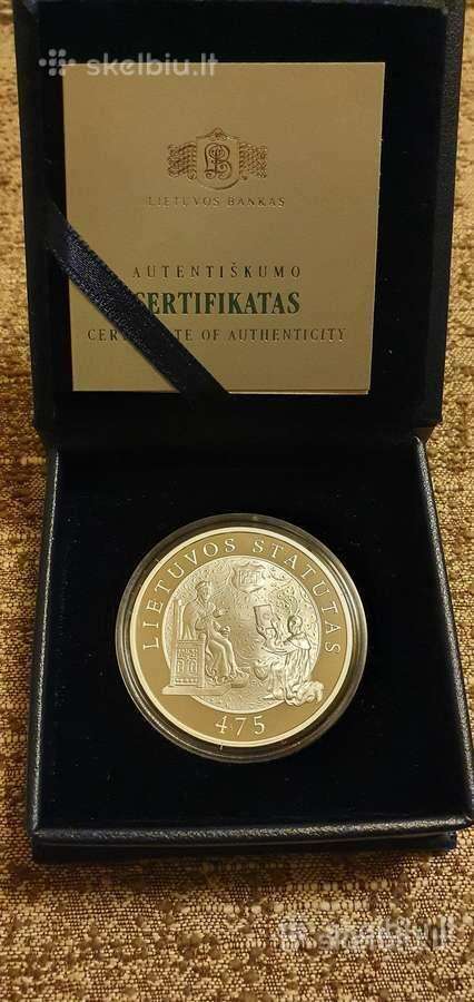 Pirksiu 50 litu. moneta statutą