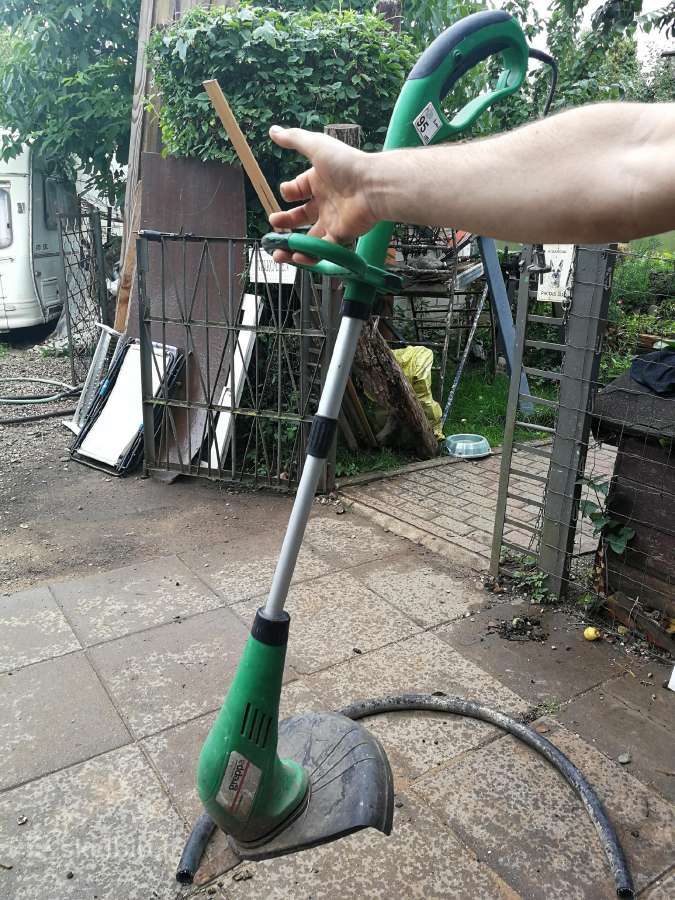 Veikiantis elektrinis žalias trimeris