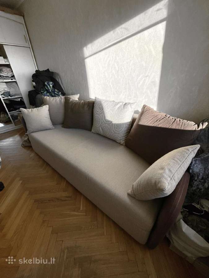 Šviesiai ruda kreminė sofa dvigulė