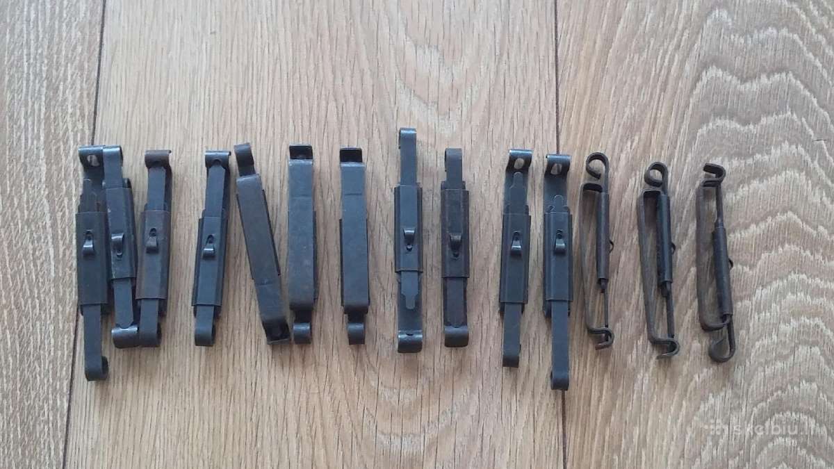 Tvirtinimai prie amunicijos diržo