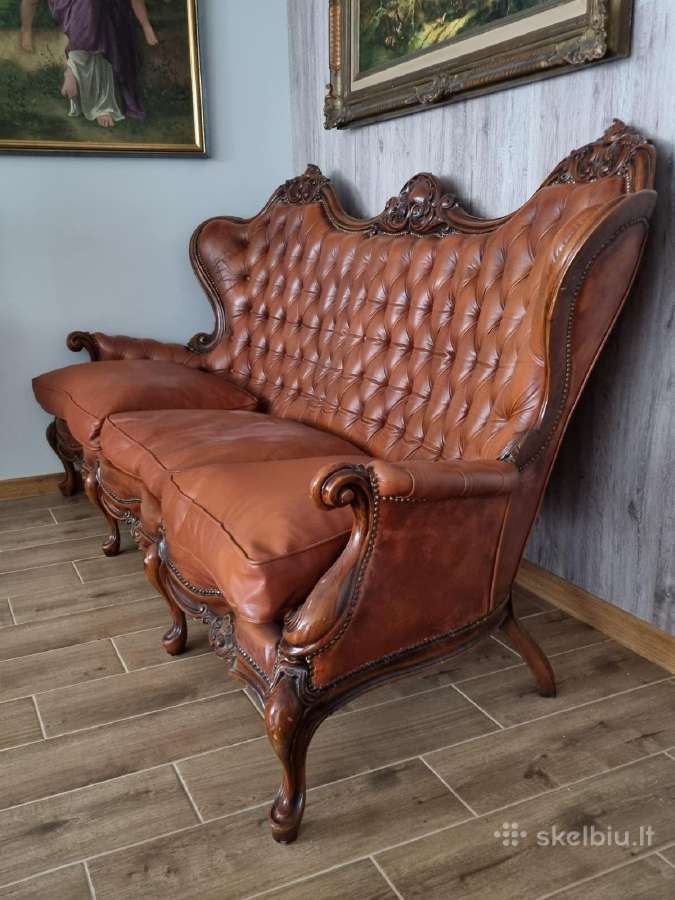 Stilinga sofa. Riešutmedis ir natūrali oda.