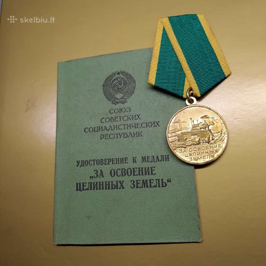 Medalis su knygute.