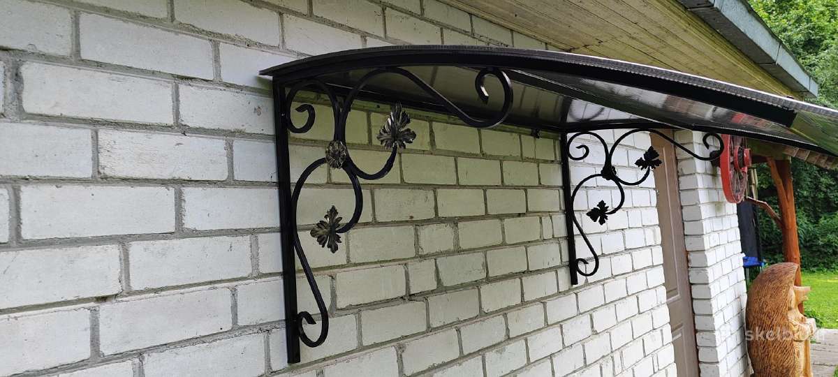 Stogeliai virš lauko durų.prancūziški balkonai - nuotraukos Nr. 12
