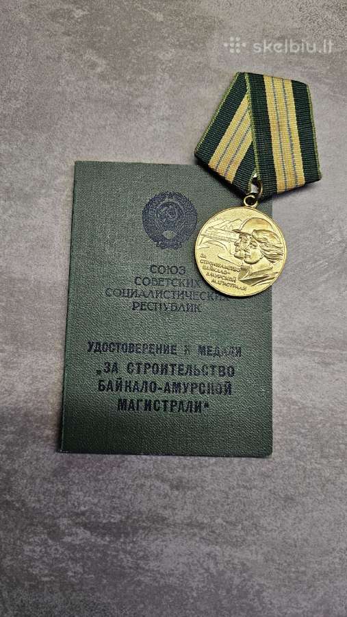 Medalis + knygutė.