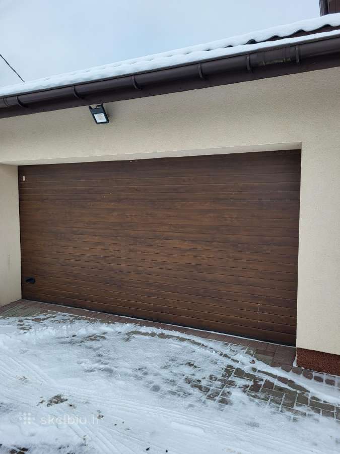 Nebrangūs pakeliami segmentiniai Garažo Vartai.