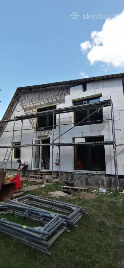 Fasadu siltinimas.