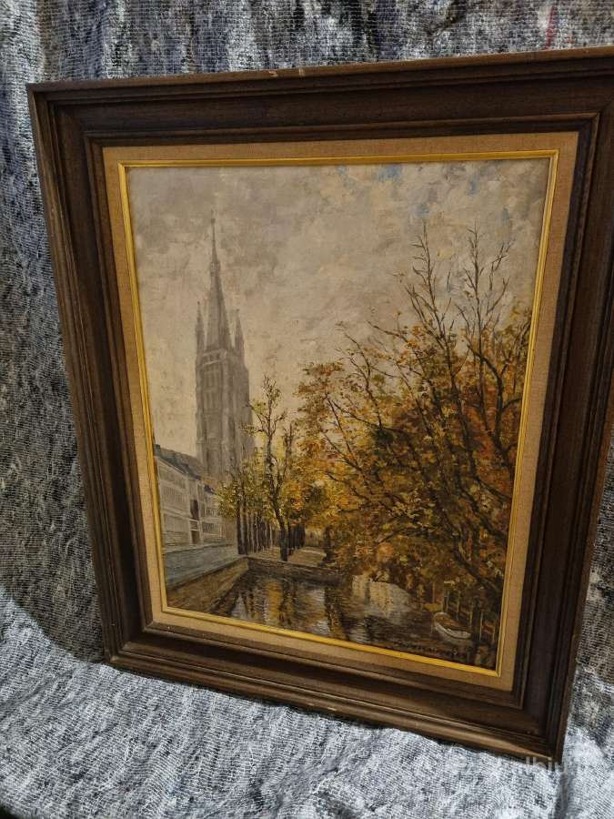 Rudeninių spalvų paveikslas su Belgijos vaizdu