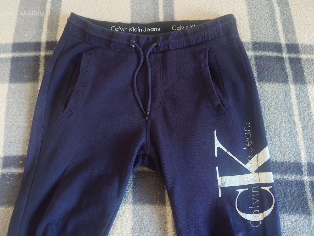Vyriškos treningines kelnės Calvin Klein.