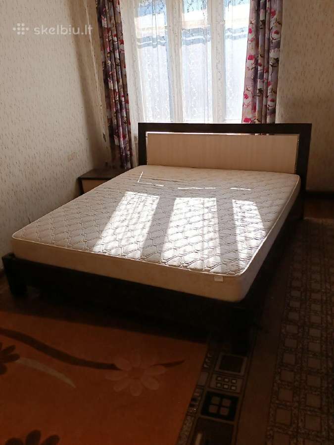 Dvigulė lova su spintele