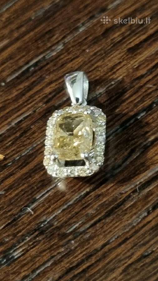 Parduoda auksinį pakabuką su 0.91ct briliantų.