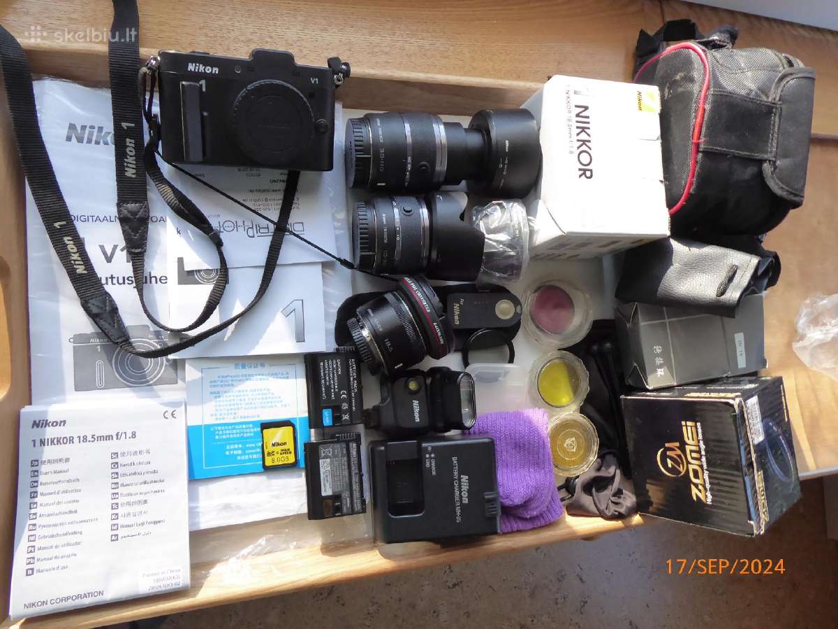 Kamera Nikon1 rimtas komplektas.