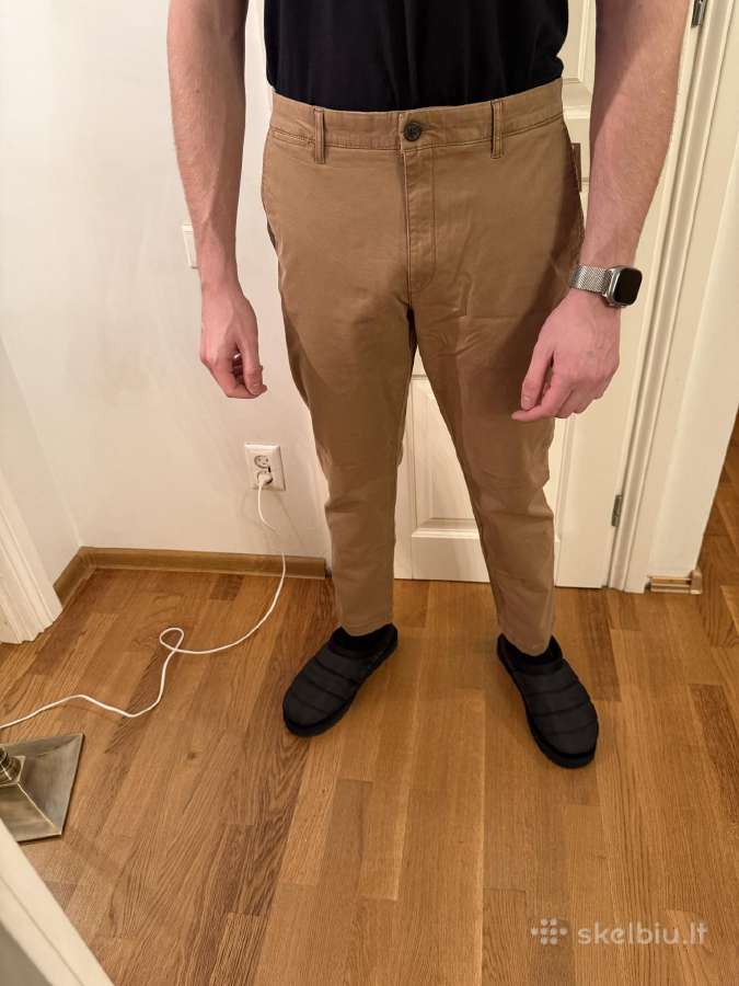 Naujos Chino kelnės