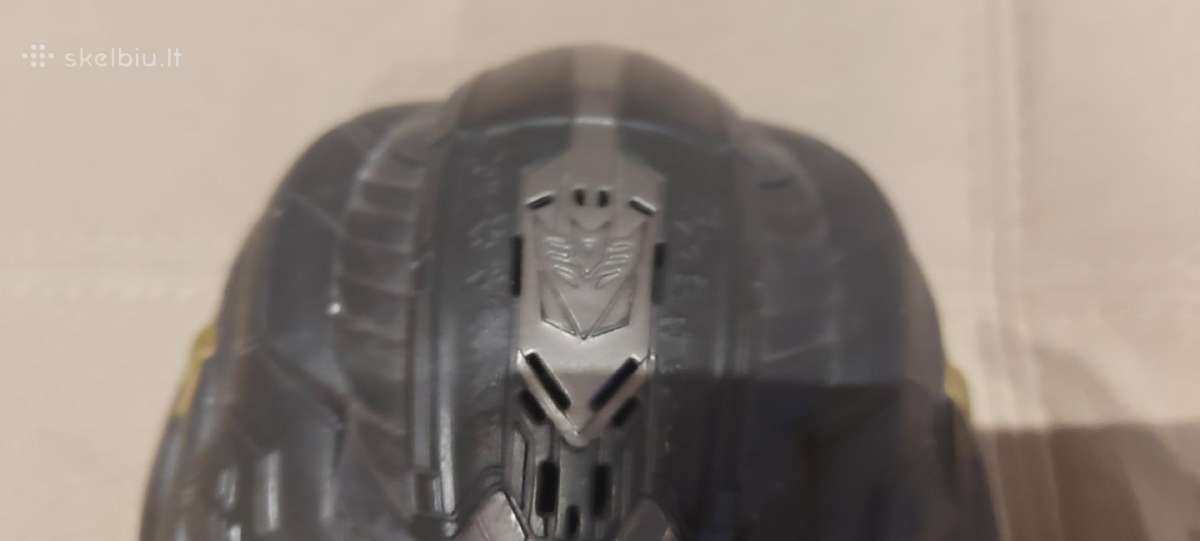 Megatrono "transformers" kaukė.