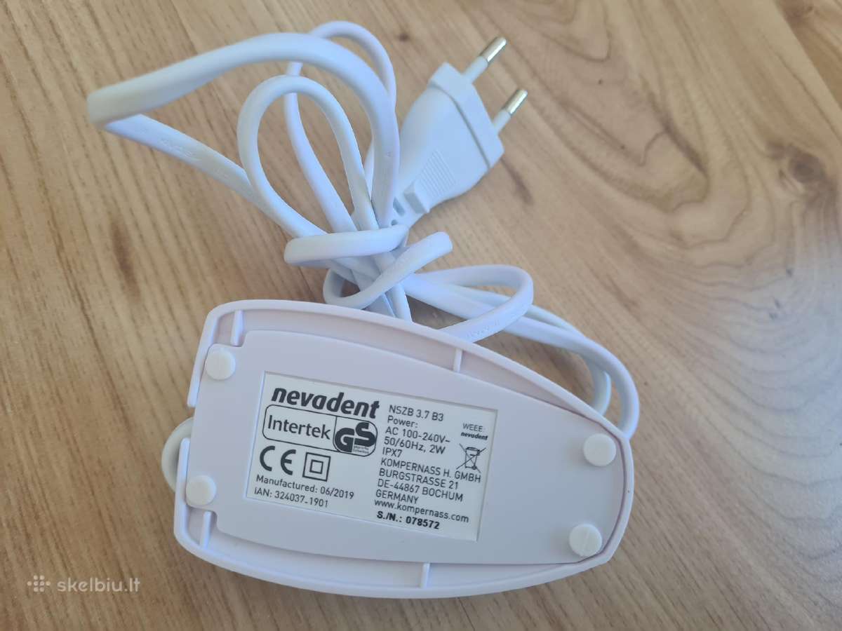 Nevadent elektrinio dantų šepetėlio pakrovėjas