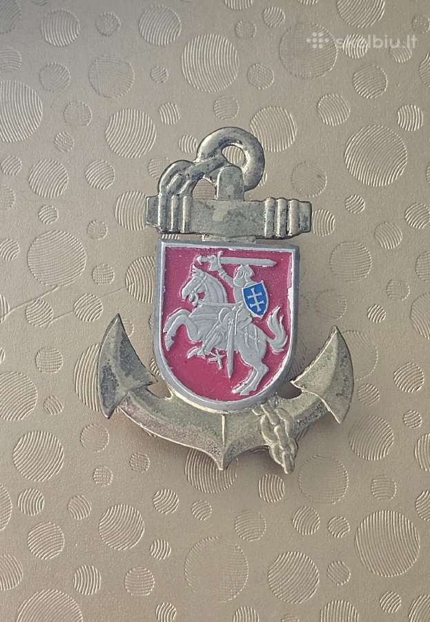 Pirmo modelio kokarda.