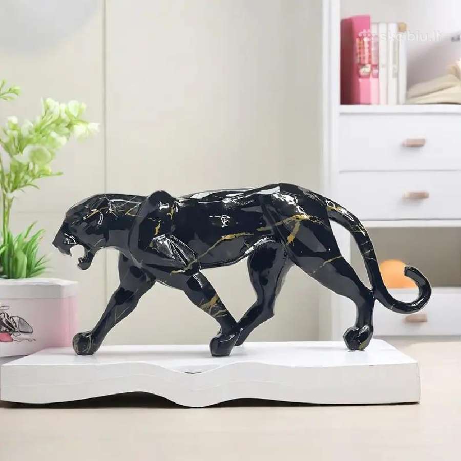 Juoda ir auksinė leopardo statulos, skulptūros