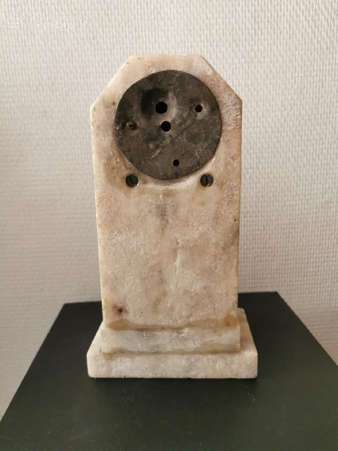 Akmeninis laikrodukas - nuotraukos Nr. 3