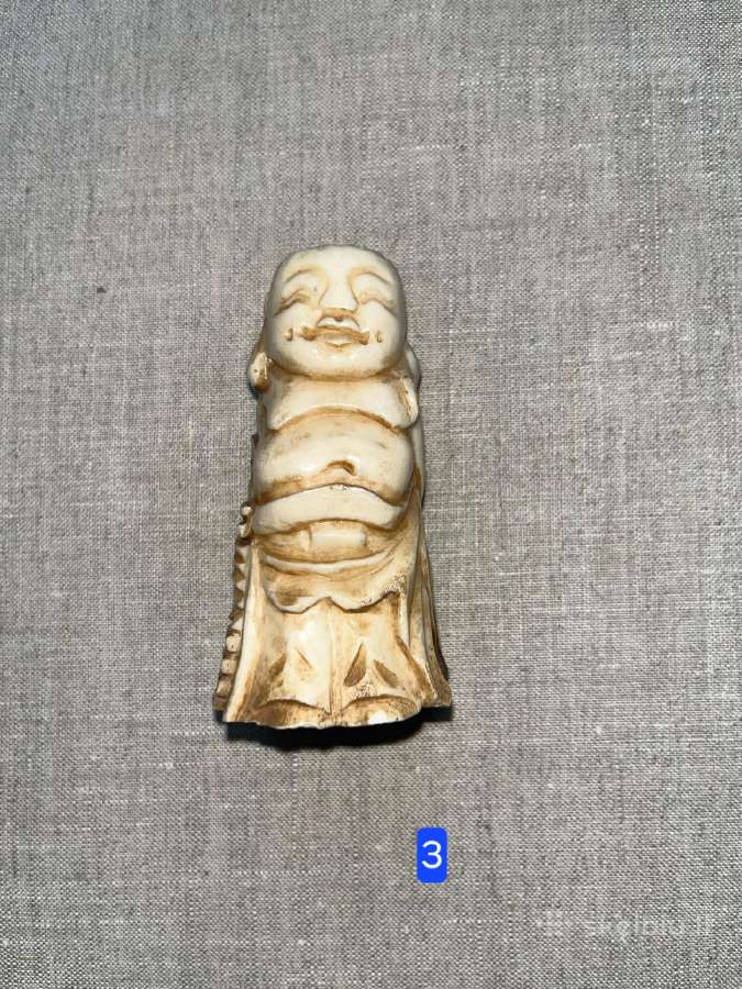 Japoniškos figürėlės iš akmens ir kaulo