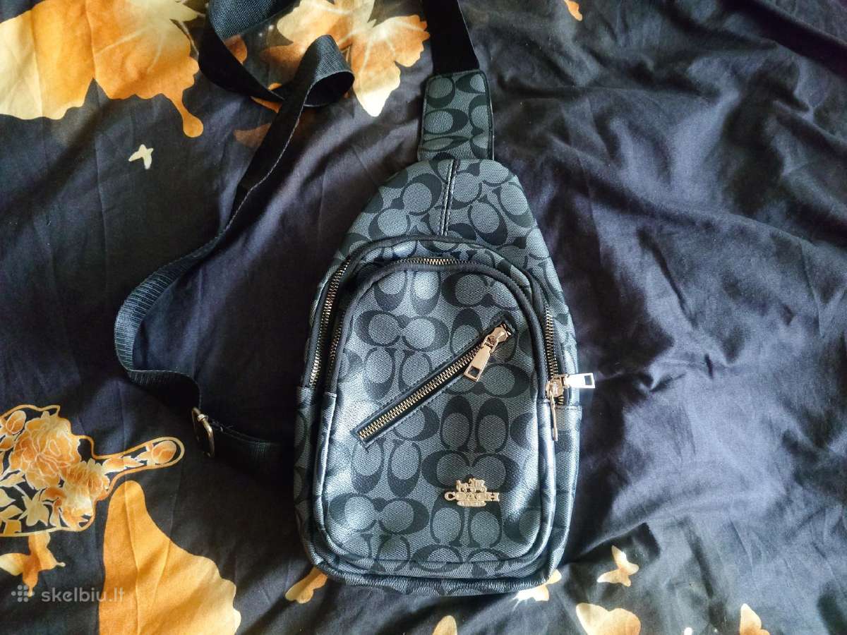 Rašė per petį Coach. Unisex.