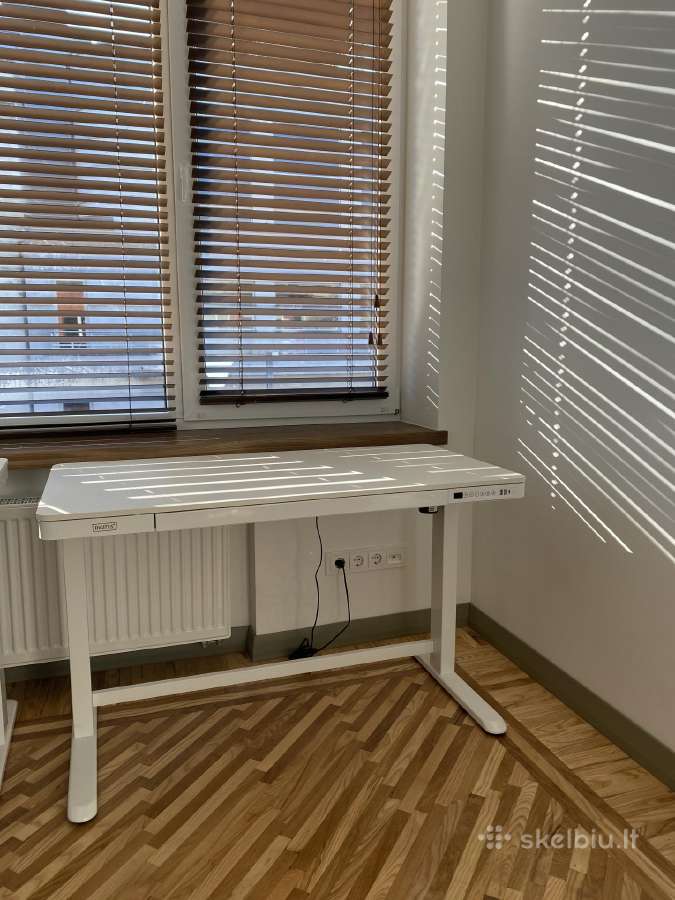 Elektrinis reguliuojamo aukščio stalas