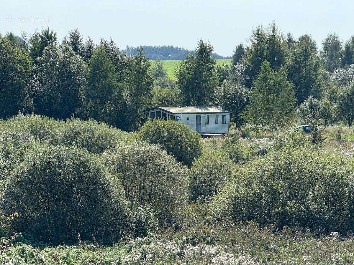 66a. sklypas tarp dviejų ežerų su mobiliuoju namu