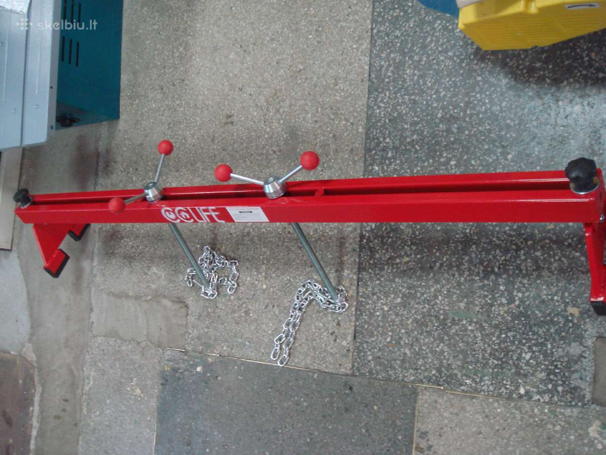 Atrama ant sparnų varikliui iškelti traversas