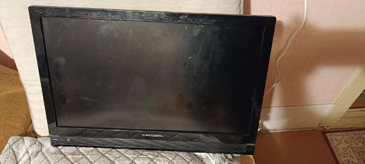 Grunding TV be pulto+garantija 22