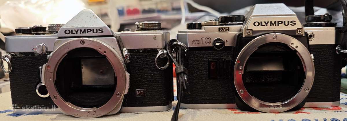 Juostiniai fotoaparatai ant dalių Olympus om1 om10