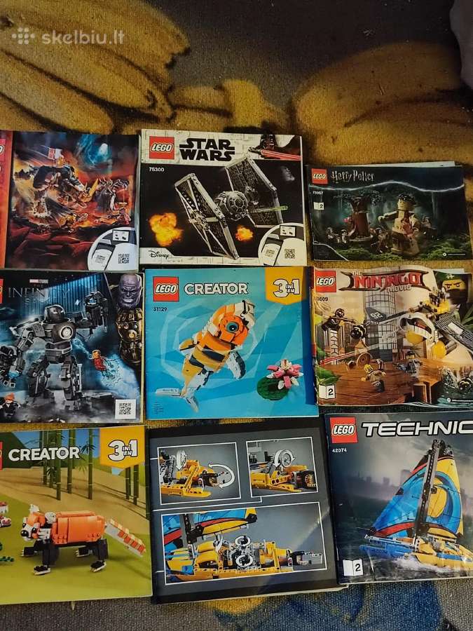 Lego instrukcijų knygelės ir du zurnalai