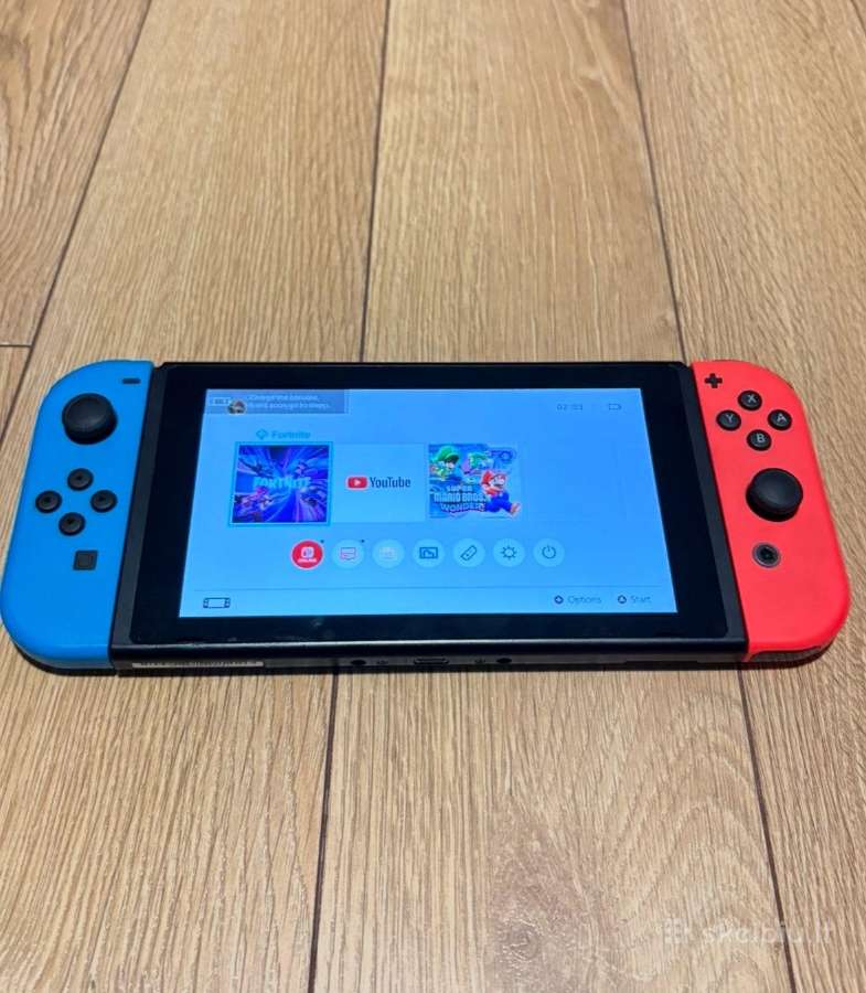 Nintendo switch + 2 žaidimai