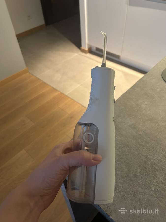 Dantu valymo aparatas inhaliatorius Waterpik