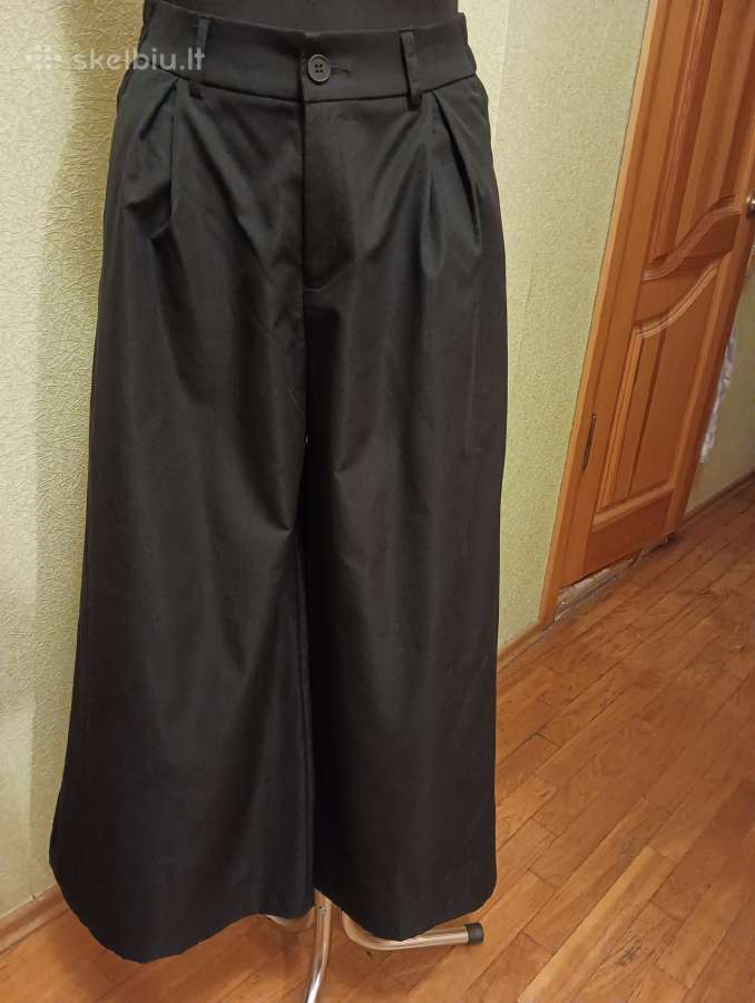 Elegantiškos plačios kelnės sijonas