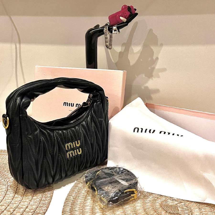 Stilinga rankinė Miumiu