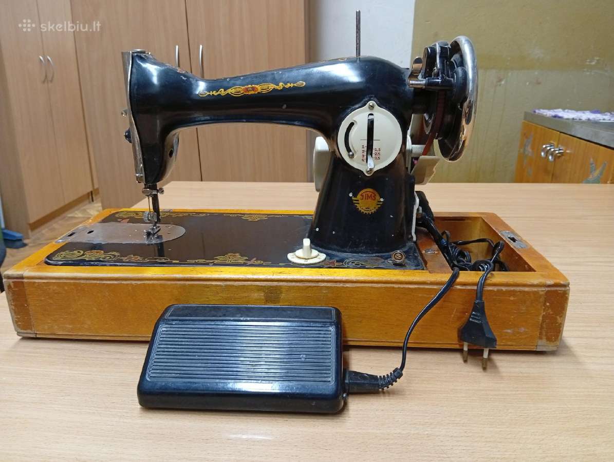 Senoviška elektrinė veikianti siuvimo mašina