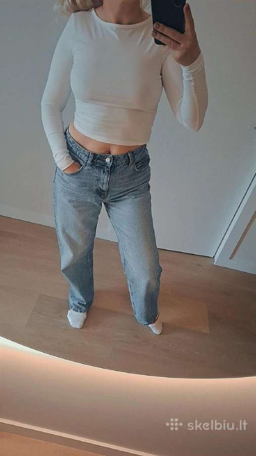 Platūs Zara džinsai