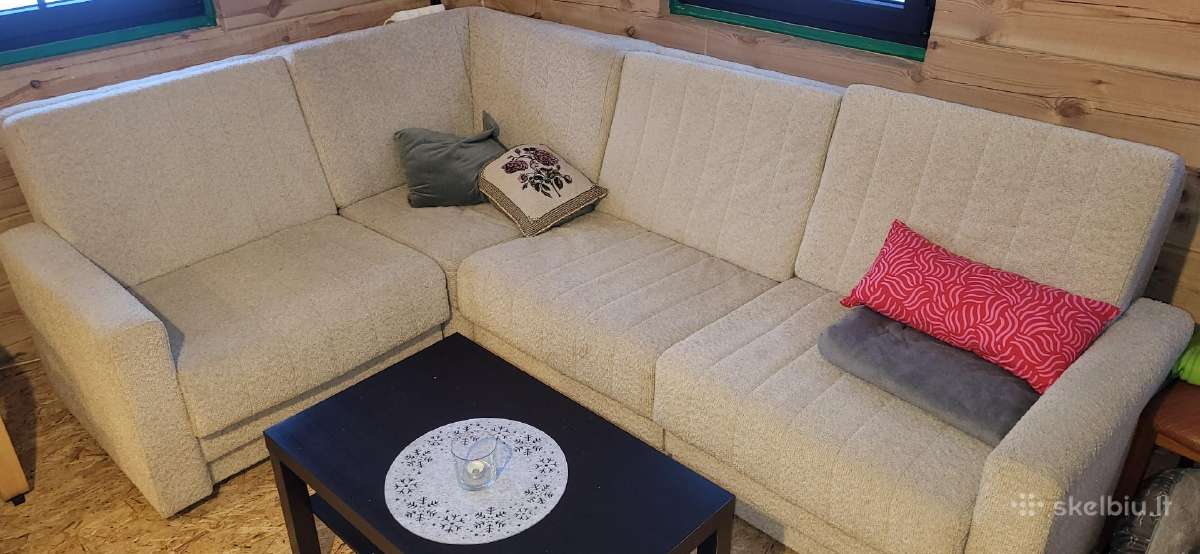 Sofa kampas su miegama funkcija