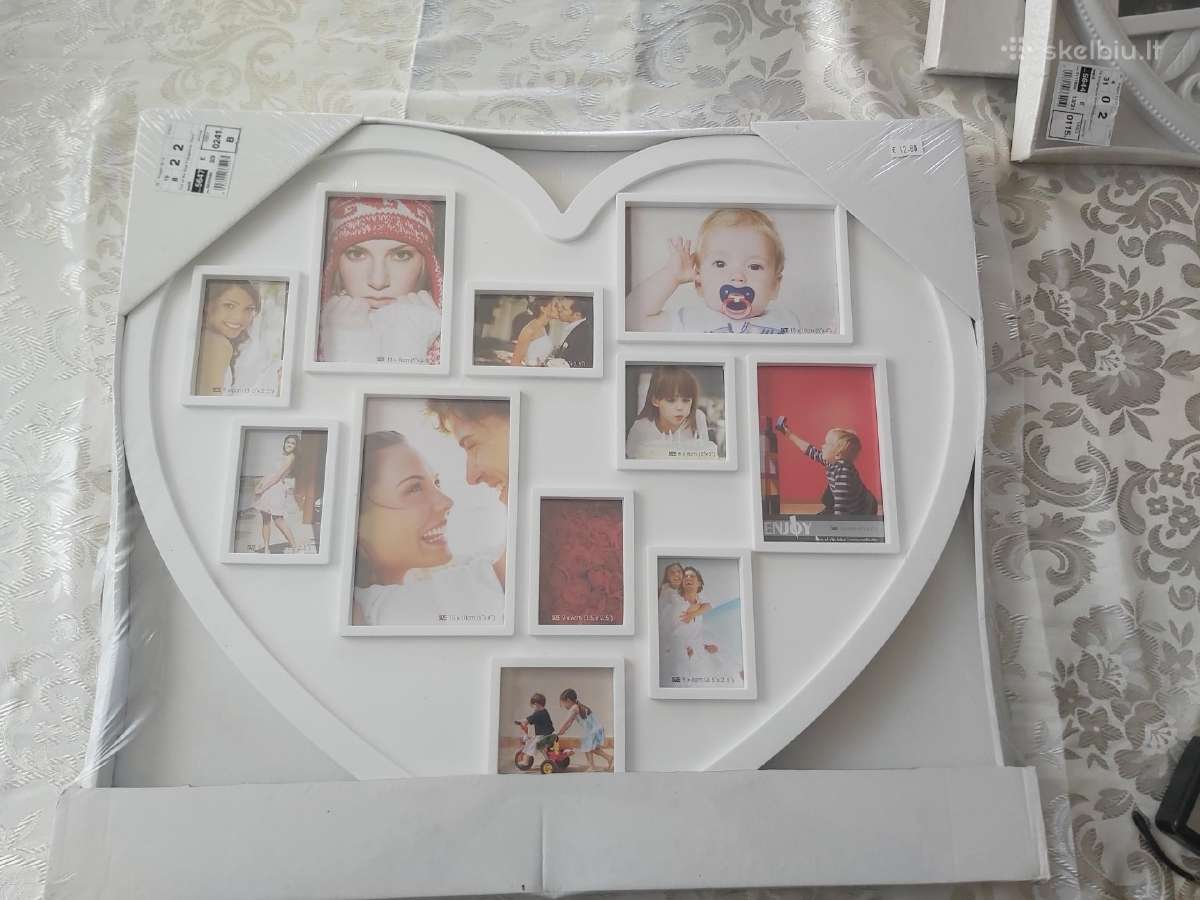 Šeimos nuotraukų rėmelis pakabinamas širdies formo