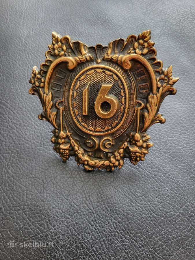 Bronzos durų numeris 16 ar 91