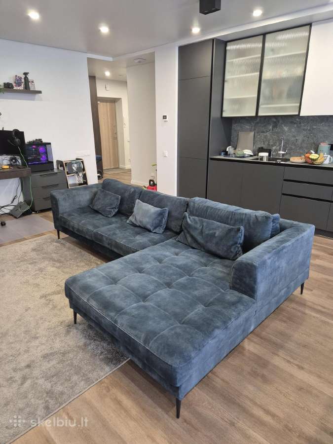 Kampinė sofa su miegamąja funkcija