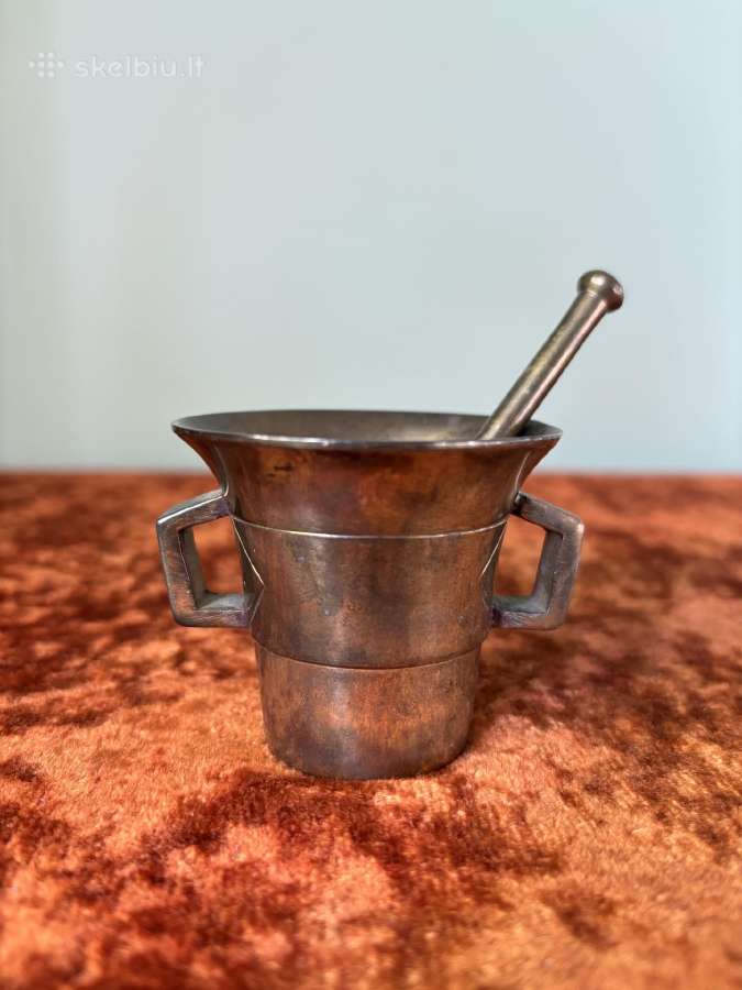 Mini grūstuvė.