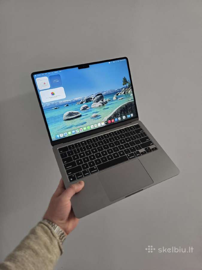 Perkame Apple MacBook kompiuterius