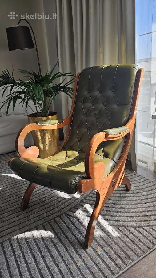 Vintažinis klubinis odinis fotelis 70s stiliumi