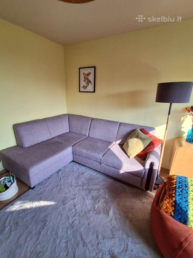 Sofa -kampas su miegama dalimi