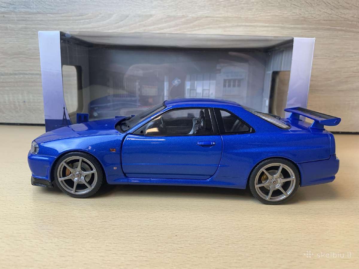 Nissan Skyline GT-r (R34), 1999 - 1:18 Solido