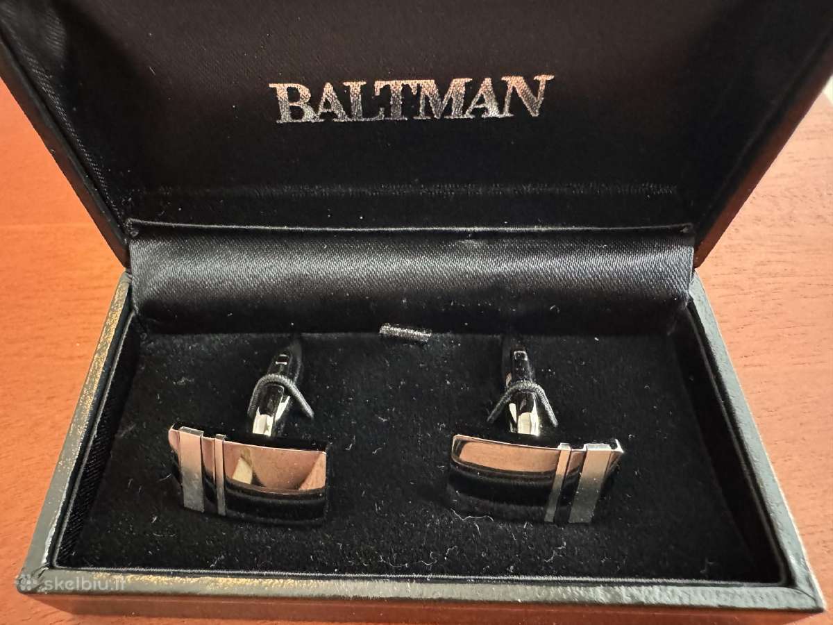 Baltman juodo blizgaus metalo elegantiškos sąsagos