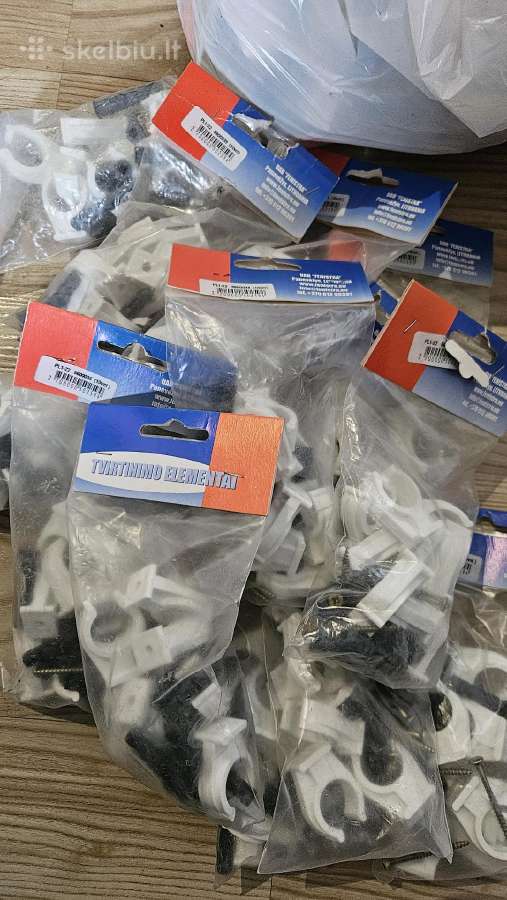 Plastikiniai vamzdžių laikikliai