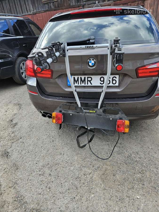 Thule triju dviračiu laikiklis, atverciamas.