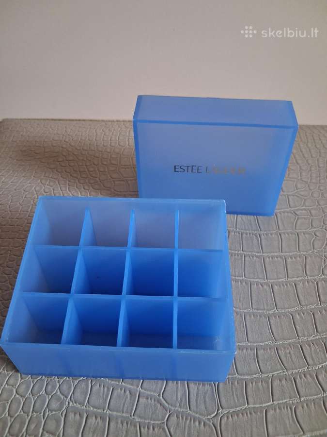 Estee Lauder mėlynas plastikinis stovas/organaizer